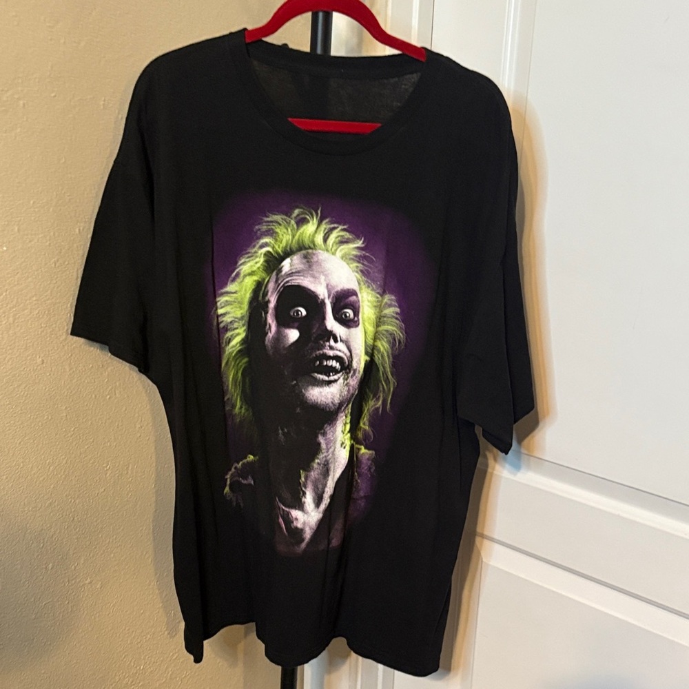 Black Graphic T-Shirt with Green and Purple Design